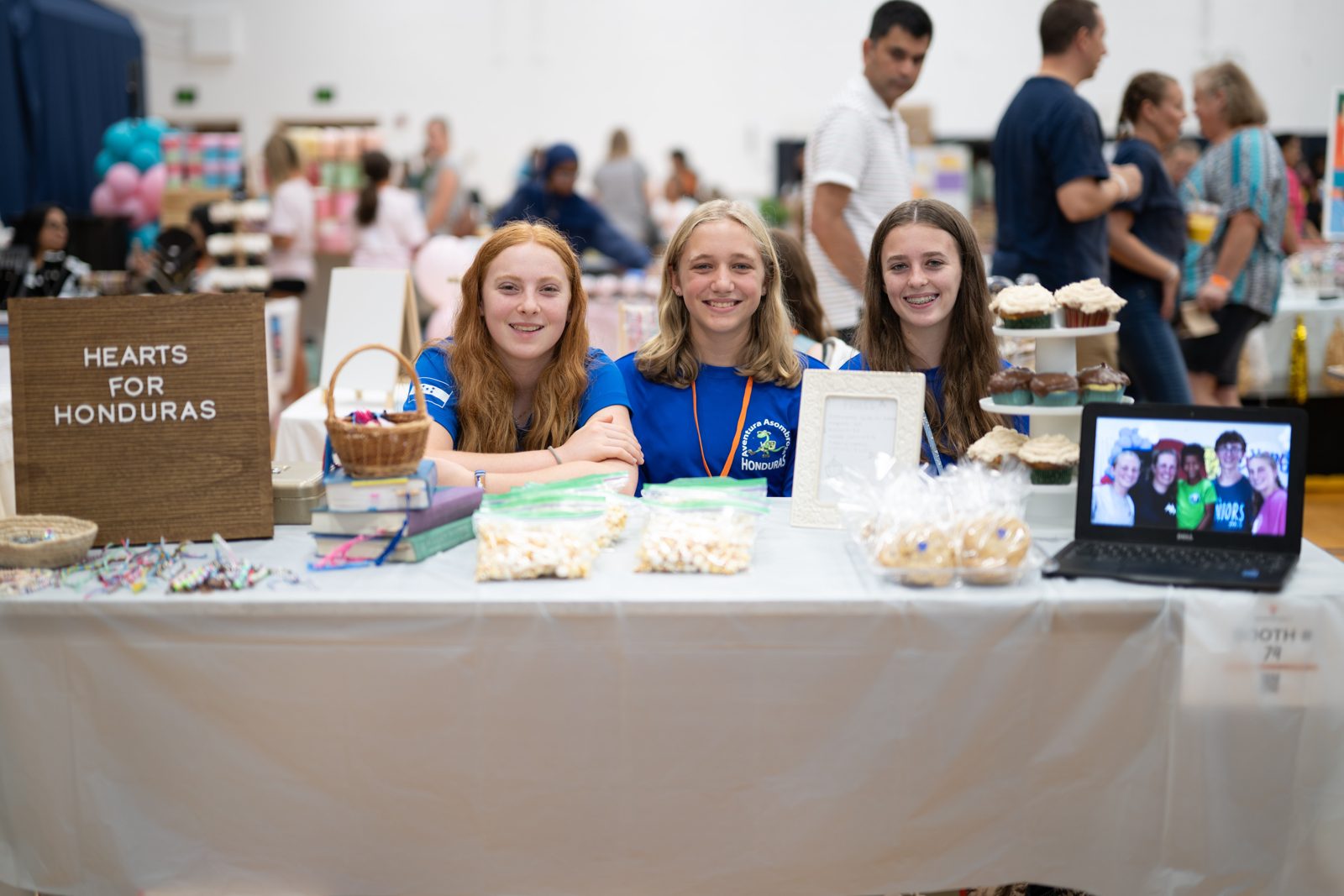 A team of young founders at their booth